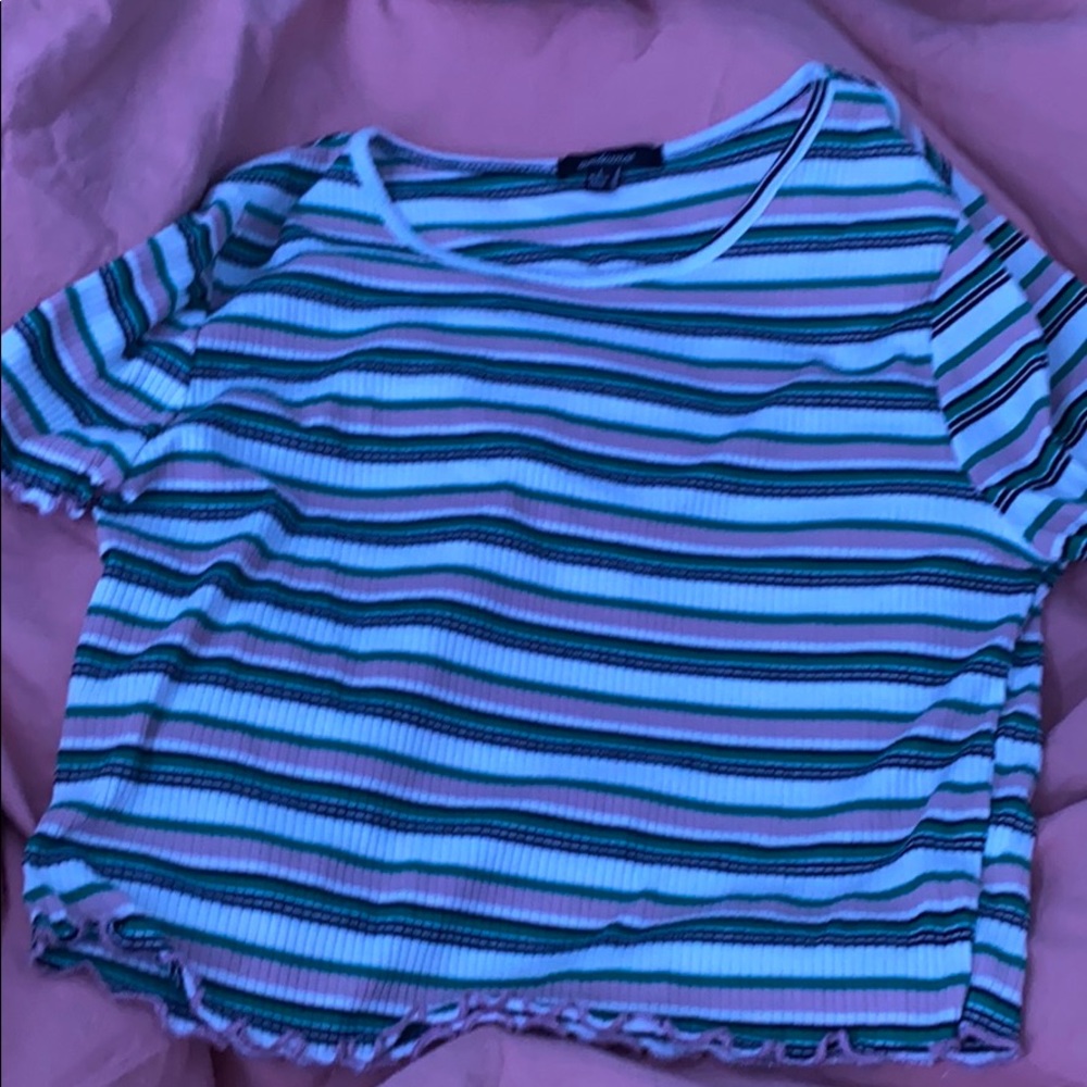 This top is soft and very cute. Worn one time.